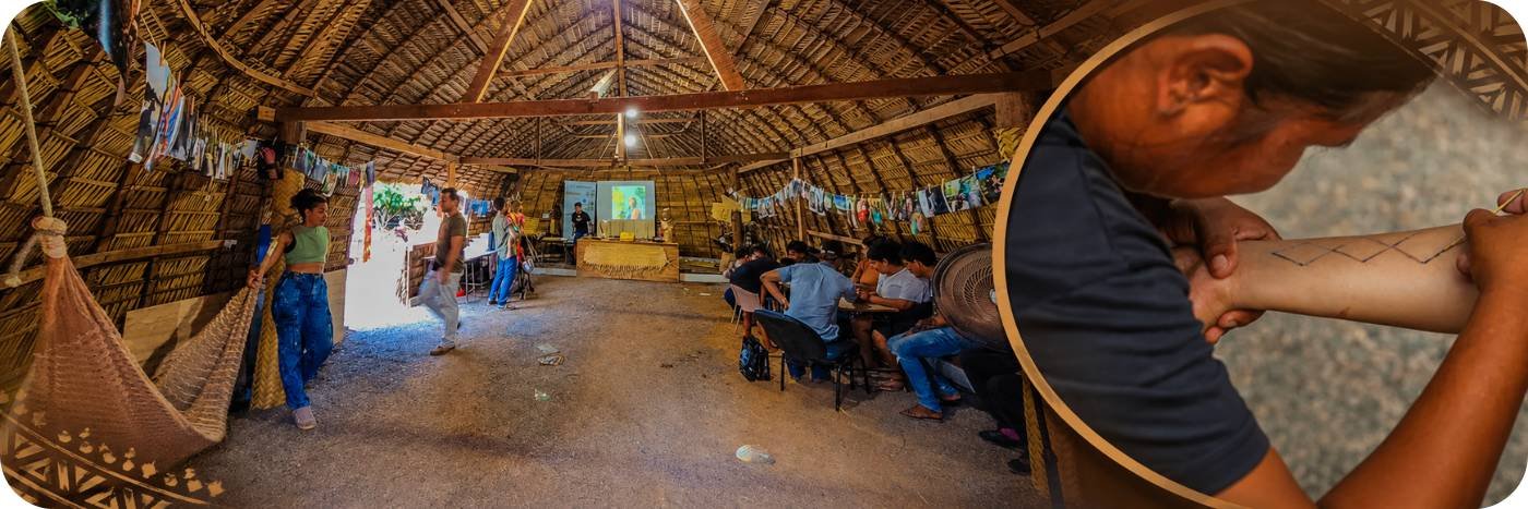 Espaço indígena com ambiente cultural e demonstração de arte corporal durante evento em Rondônia