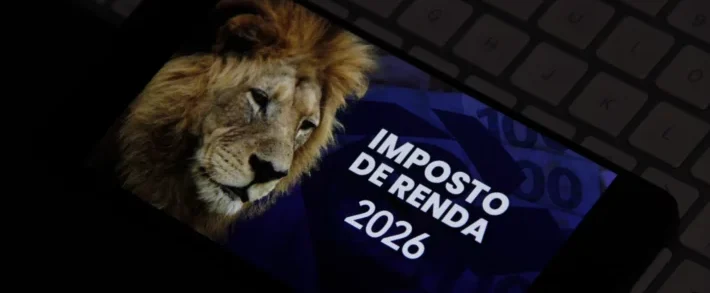 Imagem sobre IR 2026 exibido em celular com referência ao Imposto de Renda